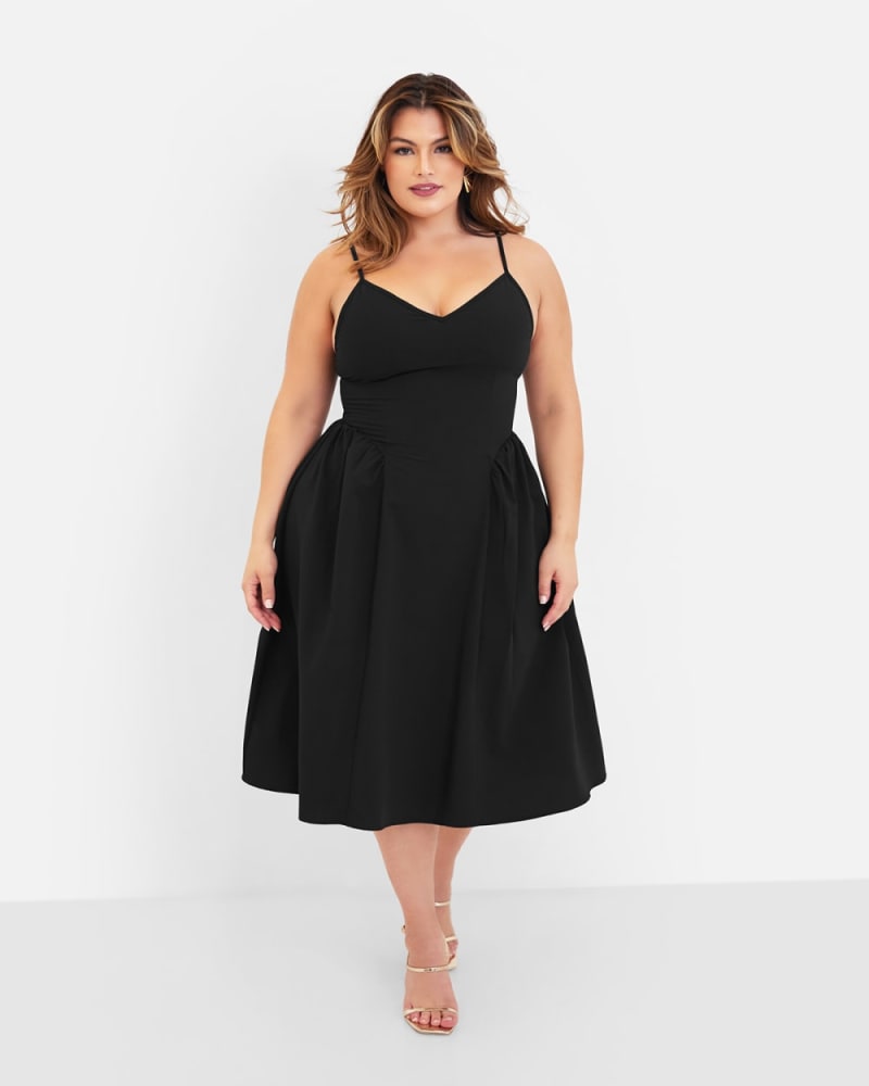 Front of a model wearing a size L Fatima Midi A Line Dress in Black by Rebdolls. | dia_product_style_image_id:328510